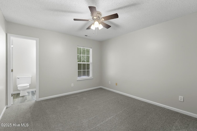 219 Live Oak Ct, Midway Park, NC 28544 - carpeted spare room featuring ceiling fan, baseboards, and a textured ceiling
