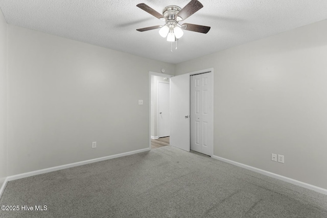 219 Live Oak Ct, Midway Park, NC 28544 - carpeted empty room featuring a ceiling fan, baseboards, and a textured ceiling