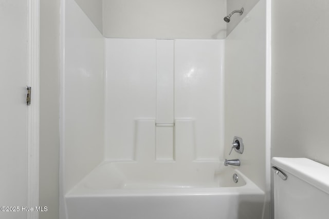 219 Live Oak Ct, Midway Park, NC 28544 - bathroom featuring toilet and bathtub / shower combination