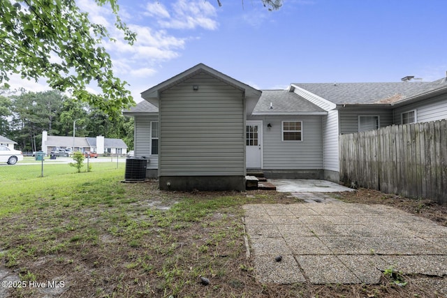 219 Live Oak Ct, Midway Park, NC 28544 - back of house with central air condition unit, a shingled roof, a patio, and entry steps