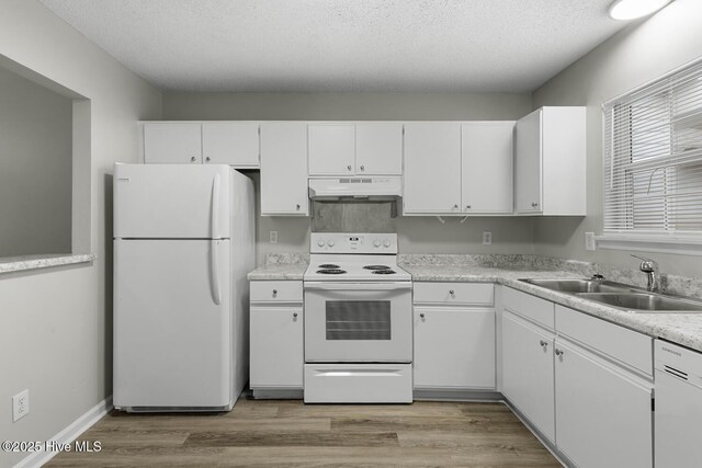 219 Live Oak Ct, Midway Park, NC 28544 - kitchen with white appliances, under cabinet range hood, a sink, white cabinetry, and light countertops
