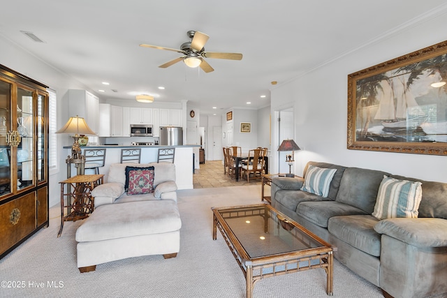 2555 St James Dr SE Unit 102, Southport, NC 28461 - living area with ceiling fan, light carpet, recessed lighting, and crown molding