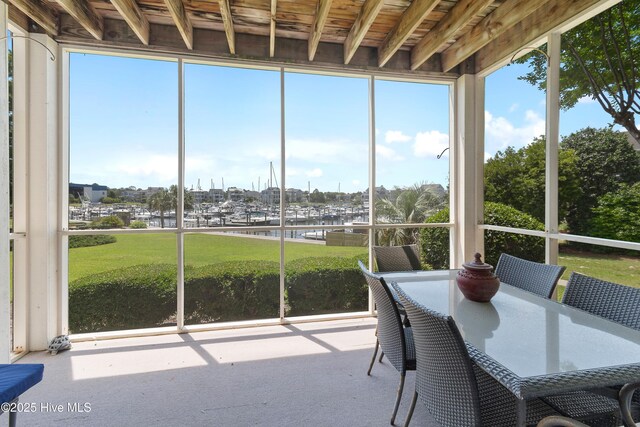2555 St James Dr SE Unit 102, Southport, NC 28461 - sunroom featuring a water view and view of marina