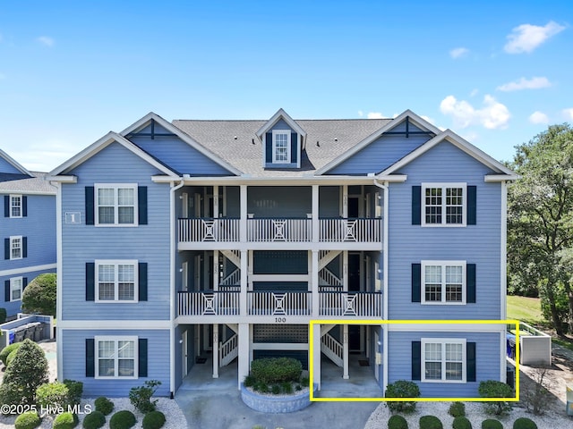 2555 St James Dr SE Unit 102, Southport, NC 28461 - view of building exterior featuring stairway