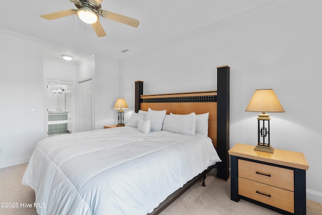 2555 St James Dr SE Unit 102, Southport, NC 28461 - bedroom featuring light carpet, crown molding, connected bathroom, baseboards, and a ceiling fan