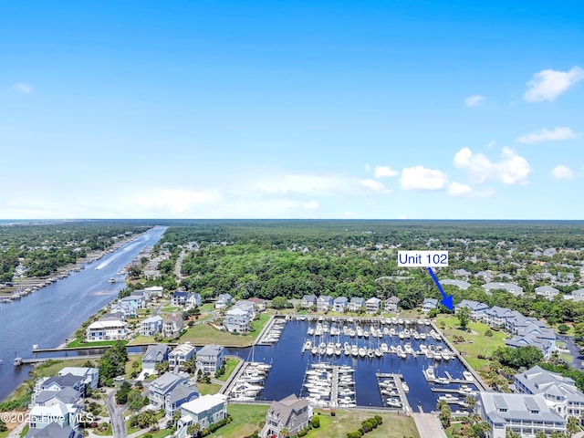 2555 St James Dr SE Unit 102, Southport, NC 28461 - aerial perspective of suburban area with a nearby body of water and a marina