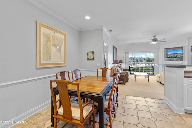 2555 St James Dr SE Unit 102, Southport, NC 28461 - dining room with ornamental molding, light tile patterned flooring, light colored carpet, a ceiling fan, and recessed lighting