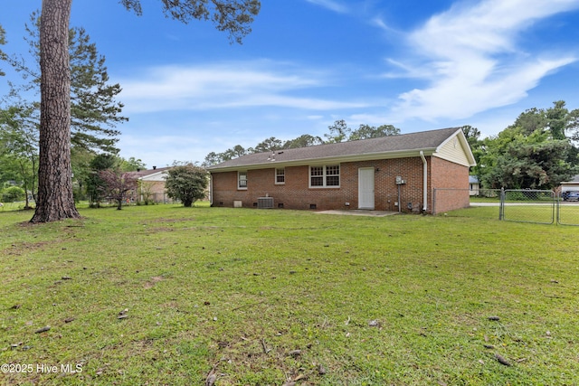 515 Brynn Marr Rd, Jacksonville, NC 28546 - back of property featuring brick siding, central air condition unit, a patio, a gate, and crawl space