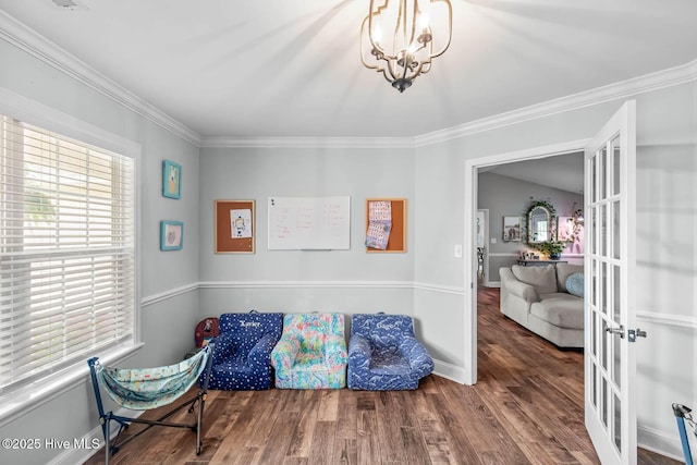912 Morganser Dr, Swansboro, NC 28584 - sitting room with french doors, crown molding, wood finished floors, and baseboards
