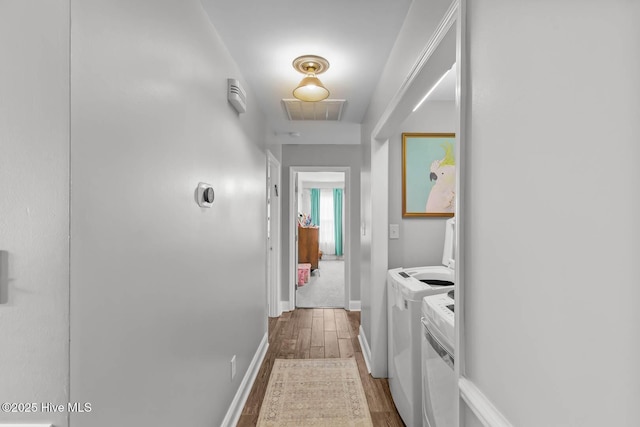 912 Morganser Dr, Swansboro, NC 28584 - washroom with independent washer and dryer, dark wood-style flooring, and baseboards