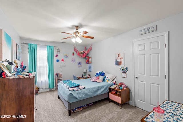912 Morganser Dr, Swansboro, NC 28584 - bedroom with light carpet and ceiling fan