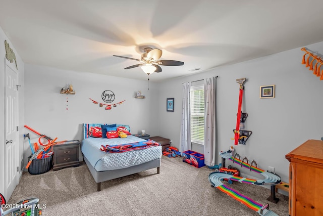 912 Morganser Dr, Swansboro, NC 28584 - bedroom with ceiling fan and carpet flooring