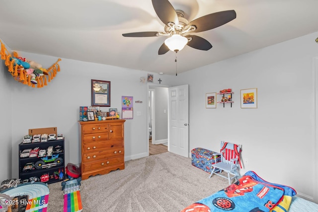 912 Morganser Dr, Swansboro, NC 28584 - bedroom featuring carpet, baseboards, and a ceiling fan