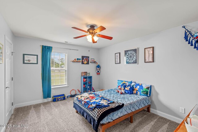 912 Morganser Dr, Swansboro, NC 28584 - bedroom with carpet flooring, baseboards, and ceiling fan