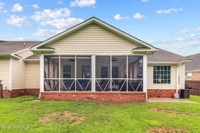 912 Morganser Dr, Swansboro, NC 28584 - rear view of house with a sunroom, a patio area, and roof with shingles