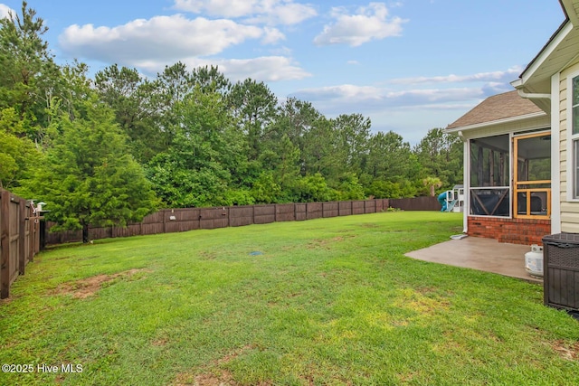 912 Morganser Dr, Swansboro, NC 28584 - view of yard featuring a sunroom and a patio area