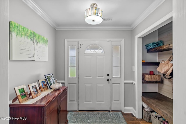 912 Morganser Dr, Swansboro, NC 28584 - foyer entrance featuring ornamental molding, dark wood finished floors, and baseboards