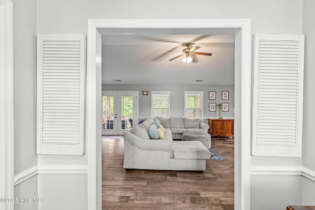912 Morganser Dr, Swansboro, NC 28584 - living room featuring french doors, ceiling fan, and dark wood-type flooring