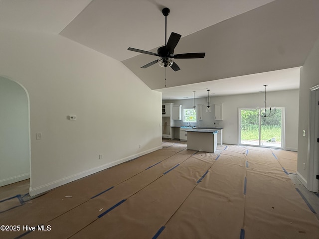 255 Atkins Rd, Cameron, NC 28326 - unfurnished living room featuring baseboards, a ceiling fan, lofted ceiling, and a sink