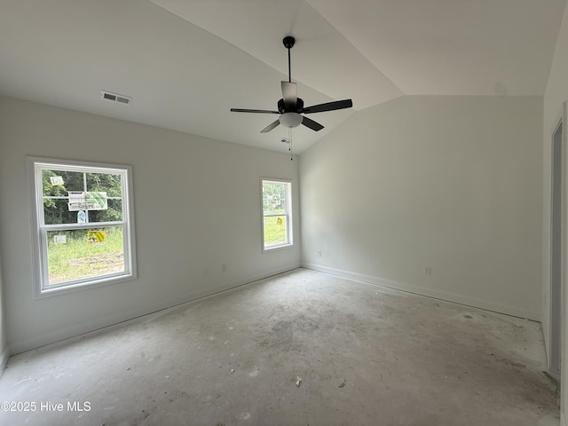255 Atkins Rd, Cameron, NC 28326 - spare room with vaulted ceiling, ceiling fan, concrete floors, and baseboards
