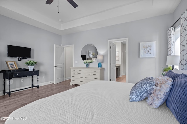 106 Josephs Pt, West End, NC 27376 - bedroom with wood finished floors, baseboards, ceiling fan, and a raised ceiling