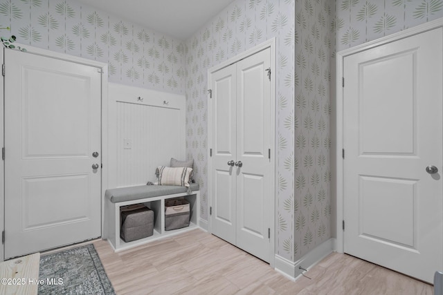 106 Josephs Pt, West End, NC 27376 - mudroom with wallpapered walls, baseboards, and wood finished floors