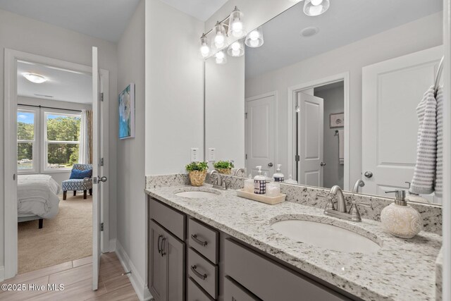 106 Josephs Pt, West End, NC 27376 - ensuite bathroom featuring double vanity and baseboards