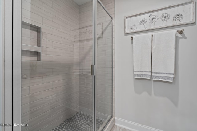 106 Josephs Pt, West End, NC 27376 - full bathroom with a stall shower and baseboards