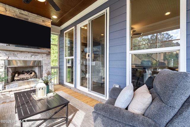 106 Josephs Pt, West End, NC 27376 - wooden deck with an outdoor stone fireplace and ceiling fan