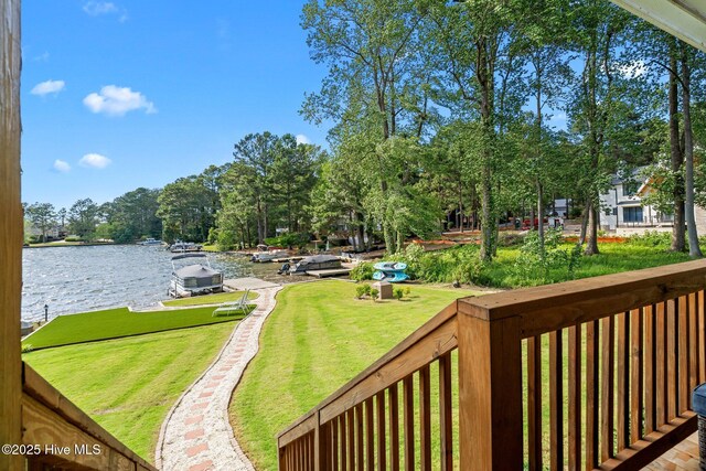 106 Josephs Pt, West End, NC 27376 - view of green lawn featuring a water view and view of wooded area