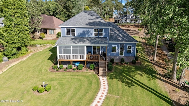 106 Josephs Pt, West End, NC 27376 - back of house featuring roof with shingles, stairs, a yard, and a deck
