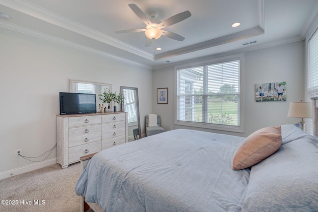 5920 Appomattox Dr, Wilmington, NC 28409 - bedroom with multiple windows, a tray ceiling, baseboards, ornamental molding, and recessed lighting
