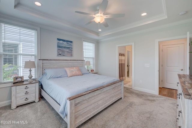 5920 Appomattox Dr, Wilmington, NC 28409 - bedroom featuring a raised ceiling, crown molding, recessed lighting, baseboards, and light colored carpet