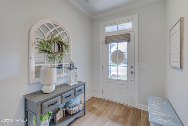 5920 Appomattox Dr, Wilmington, NC 28409 - foyer entrance featuring light wood finished floors, ornamental molding, and baseboards