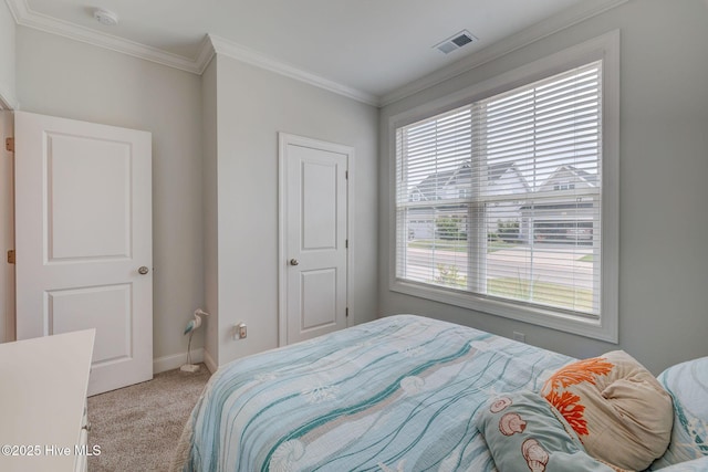 5920 Appomattox Dr, Wilmington, NC 28409 - bedroom with carpet, multiple windows, ornamental molding, and baseboards