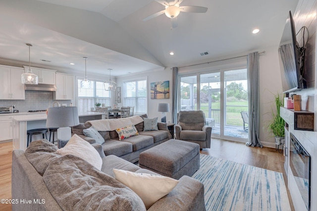 5920 Appomattox Dr, Wilmington, NC 28409 - living area featuring light wood-style flooring, ceiling fan, vaulted ceiling, recessed lighting, and baseboards