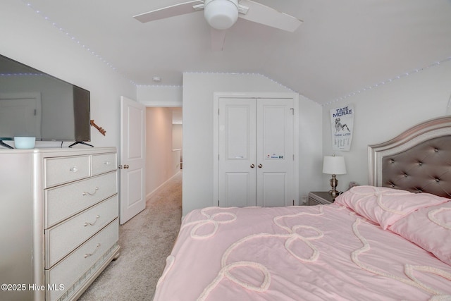 5920 Appomattox Dr, Wilmington, NC 28409 - bedroom featuring light carpet, lofted ceiling, a closet, and a ceiling fan
