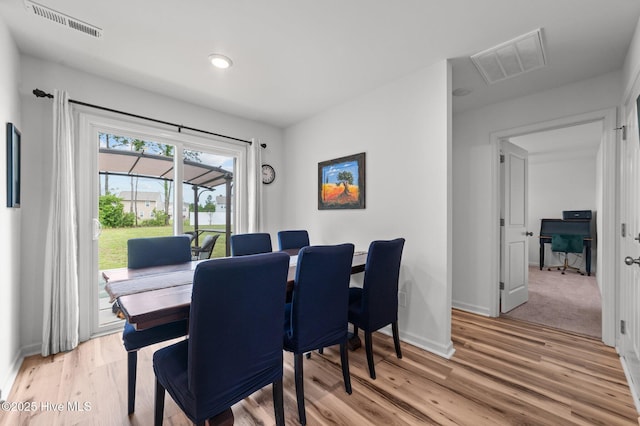 3402 Woodwind Ct, Kinston, NC 28504 - dining space with baseboards, light wood-type flooring, and recessed lighting