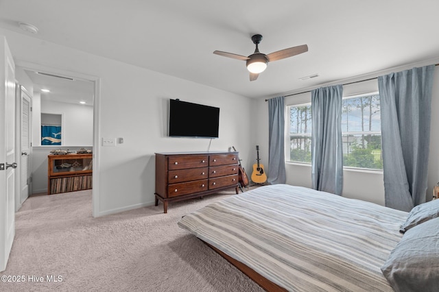 3402 Woodwind Ct, Kinston, NC 28504 - carpeted bedroom with baseboards and ceiling fan