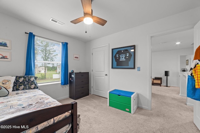 3402 Woodwind Ct, Kinston, NC 28504 - bedroom featuring light carpet, baseboards, and a ceiling fan