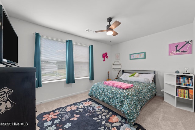 3402 Woodwind Ct, Kinston, NC 28504 - carpeted bedroom with baseboards and a ceiling fan
