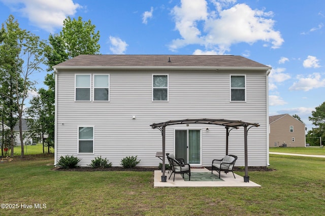 3402 Woodwind Ct, Kinston, NC 28504 - rear view of property with a lawn, a patio, and roof with shingles