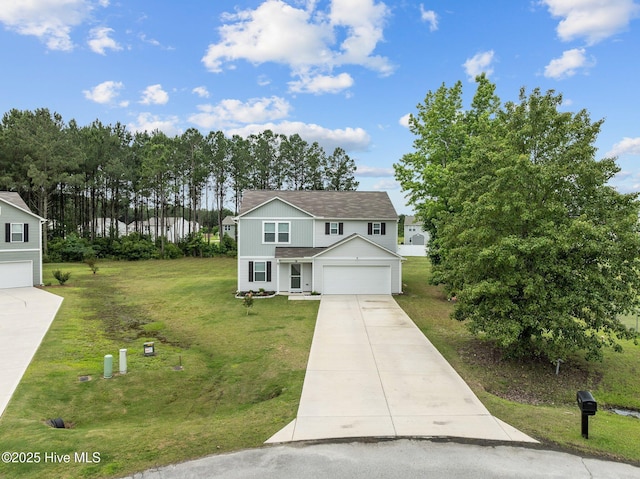 3402 Woodwind Ct, Kinston, NC 28504 - traditional home with driveway, a garage, and a front yard