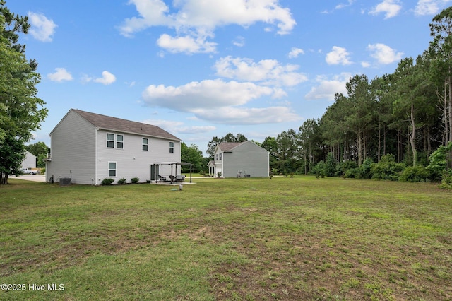 3402 Woodwind Ct, Kinston, NC 28504 - view of green lawn featuring central air condition unit