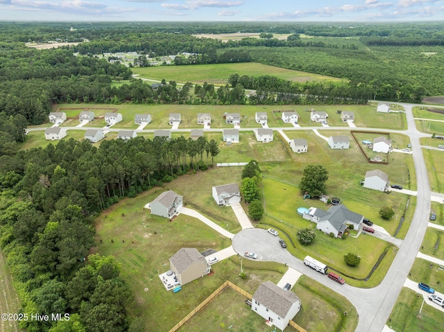 3402 Woodwind Ct, Kinston, NC 28504 - aerial overview of property's location with a forest