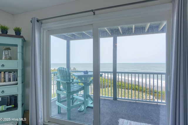 1896 New River Inlet Rd Unit 1212, North Topsail Beach, NC 28460 - sunroom with a water view and plenty of natural light