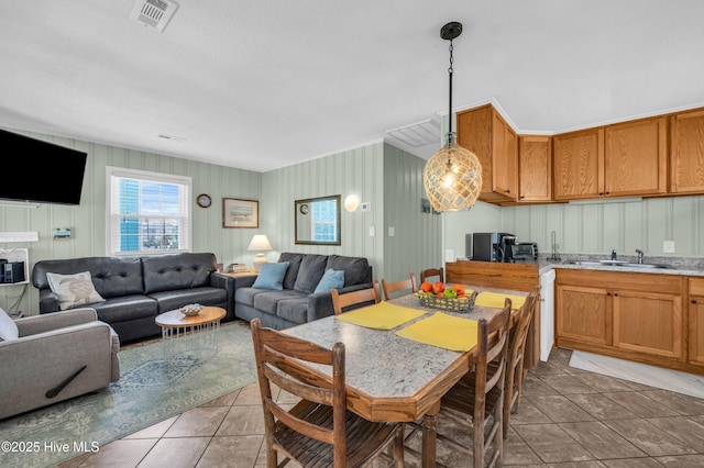 1020 Carolina Beach Ave N, Carolina Beach, NC 28428 - dining room featuring light tile patterned floors