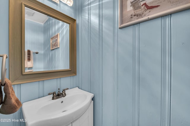 1020 Carolina Beach Ave N, Carolina Beach, NC 28428 - bathroom featuring a sink and a decorative wall