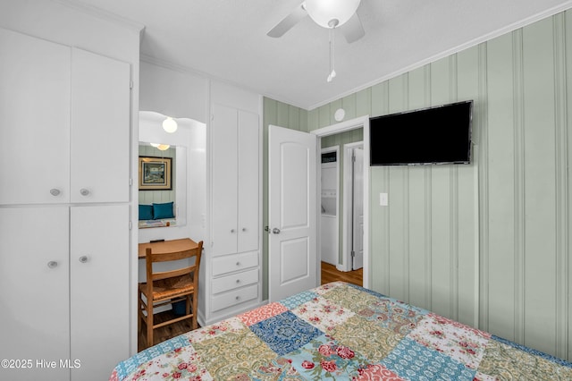 1020 Carolina Beach Ave N, Carolina Beach, NC 28428 - bedroom featuring crown molding, an office area, wood finished floors, and ceiling fan