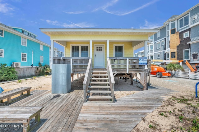1020 Carolina Beach Ave N, Carolina Beach, NC 28428 - view of front of property featuring a porch